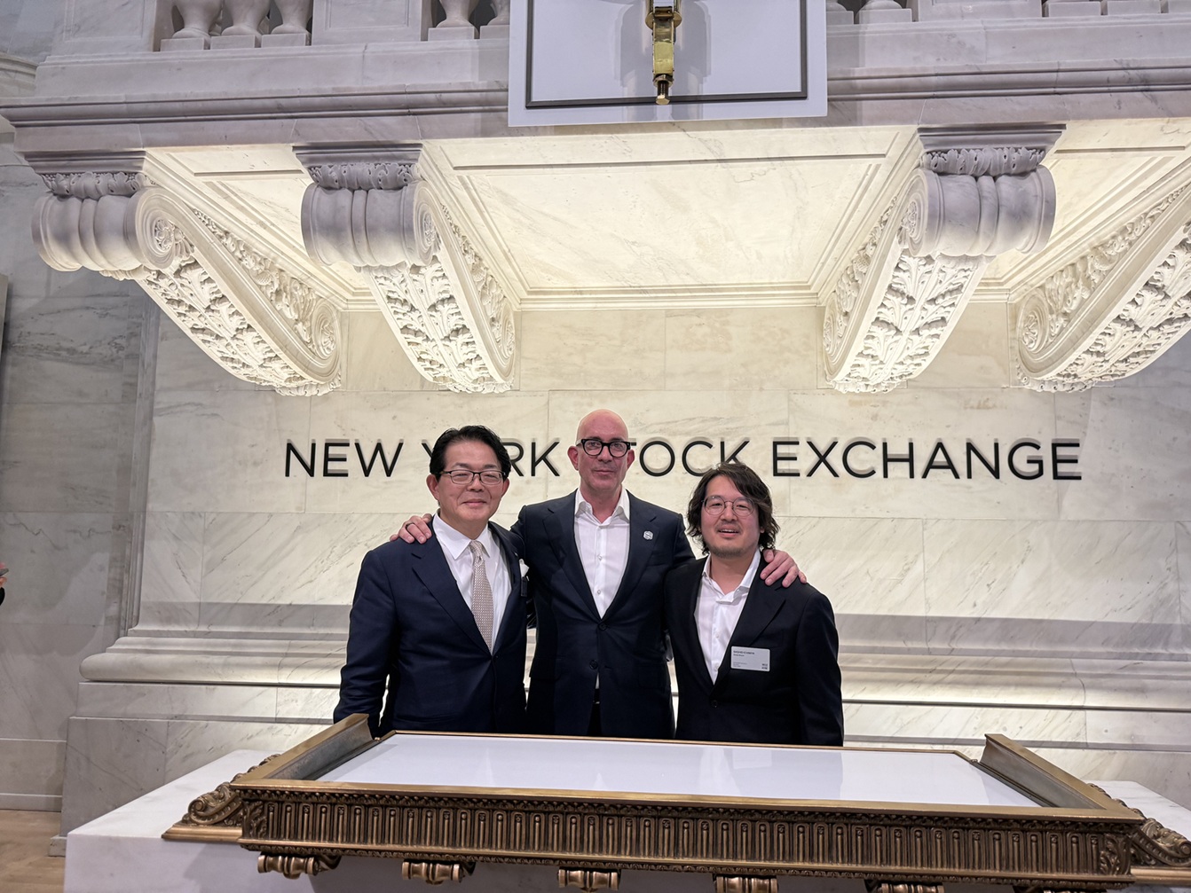 Yasuhiko Yurimoto, Securitize CEO Carlos Domingo, and Shohei Ichimiya